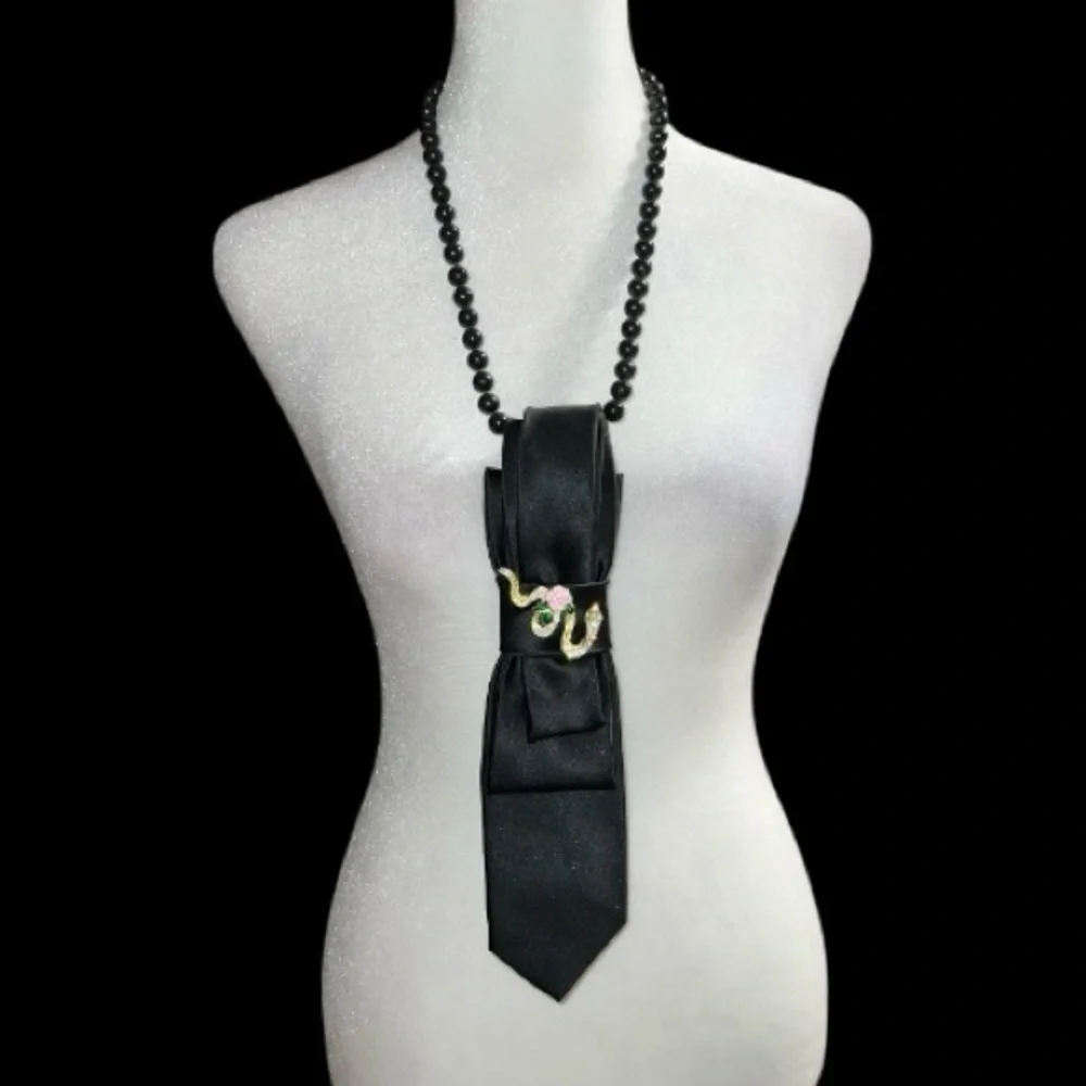 “Dainty Dapper”  Black necktie Necklace with Gold and Pink Accent serpent pin.